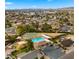 Community amenities including a pool, playground, basketball court, and green space, all within the neighborhood at 4939 W Joyce Cir, Glendale, AZ 85308