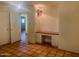 Bedroom features textured walls, built-in desk, and decorative chandelier at 537 N Jay St, Chandler, AZ 85225