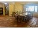 Dining room featuring tile floors, textured walls, and formal dining table at 537 N Jay St, Chandler, AZ 85225