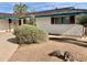 Charming single-story home featuring a well-manicured front yard with low-maintenance desert landscaping at 537 N Jay St, Chandler, AZ 85225