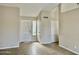 Bright entryway featuring neutral walls, tiled flooring, and a view of the front door at 5552 W Willow Ave, Glendale, AZ 85304