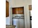 Convenient laundry area is neatly tucked away and includes a washer and dryer at 5552 W Willow Ave, Glendale, AZ 85304