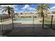 Backyard pool area has mature palm trees, newer fencing, and pebble landscaping at 5552 W Willow Ave, Glendale, AZ 85304