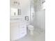 Clean bathroom with stand up shower, custom tile, and ample natural light at 5601 E Monterosa St, Phoenix, AZ 85018