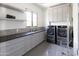 Well-lit laundry room with modern appliances and ample counter space at 5601 E Monterosa St, Phoenix, AZ 85018