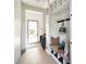 Hallway mudroom with built in bench, hooks and storage at 5601 E Monterosa St, Phoenix, AZ 85018