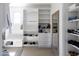 Organized walk-in closet with ample shelving, clothing rods, and storage space for shoes at 5601 E Monterosa St, Phoenix, AZ 85018