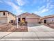 Charming single story home with desert landscaping and a two-car garage at 6847 W Palo Brea Ln, Peoria, AZ 85383