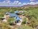 Aerial view of neighborhood playground with shade canopies for Gathering-friendly outdoor activities at 6847 W Palo Brea Ln, Peoria, AZ 85383