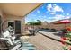 Inviting backyard with a covered patio, seating, and pool at 7161 W Saddlehorn Rd, Peoria, AZ 85383