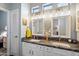 Bathroom featuring double sinks and granite countertops at 7161 W Saddlehorn Rd, Peoria, AZ 85383