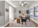 Bright dining area with natural light, rustic table, and bench seating at 850 E Vaughn Ave, Gilbert, AZ 85234