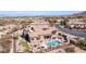 Breathtaking aerial shot of a desert home featuring a private pool and a beautiful backyard oasis at 8612 S 30 Th Way, Phoenix, AZ 85042