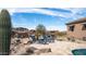 Outdoor patio featuring lounge chairs, desert landscaping, and mountain views at 8612 S 30 Th Way, Phoenix, AZ 85042