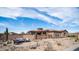 Tan single story home featuring stucco siding, clay tile roof and desert landscaping at 8612 S 30 Th Way, Phoenix, AZ 85042