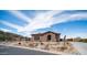 Tan single story home featuring stucco siding, clay tile roof and desert landscaping at 8612 S 30 Th Way, Phoenix, AZ 85042