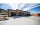 Large home with expansive driveway and three-car garage with plenty of space for storage at 8612 S 30 Th Way, Phoenix, AZ 85042