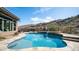 Stunning swimming pool with a spa, water feature, and views of the desert hills at 8612 S 30 Th Way, Phoenix, AZ 85042