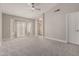 Spacious main bedroom featuring an attached bathroom entrance and bright windows at 9633 S 51St St, Phoenix, AZ 85044