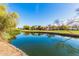 Beautiful pond scenery reflecting the trees and sky at 9633 S 51St St, Phoenix, AZ 85044