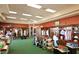 Inside the pro shop with golf equipment on display and a green carpet at 9638 E Tranquility Way, Sun Lakes, AZ 85248