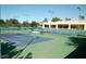 Well-maintained tennis courts on a sunny day at the community at 9638 E Tranquility Way, Sun Lakes, AZ 85248