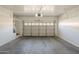 Spacious two-car garage featuring ample room for parking and storage, with an automatic door opener at 1170 S Agnes Ln, Gilbert, AZ 85296