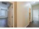 Hallway with wood look floors and white trim at 1170 S Agnes Ln, Gilbert, AZ 85296