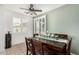 Inviting dining room with natural light, neutral decor, and a charming chandelier at 12180 W Rio Vista Ln, Avondale, AZ 85323