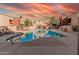 Community pool and lounge area for resident enjoyment at 1340 N Recker Rd # 312, Mesa, AZ 85205