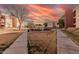 Well-maintained exterior showcasing lush landscaping and community gathering areas at 1340 N Recker Rd # 312, Mesa, AZ 85205