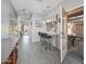Cozy kitchen nook with a counter bar overlooking the backyard at 16038 W Acapulco Ln, Surprise, AZ 85379