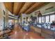The bright interior of Cafe Bebida features an espresso bar and comfortable seating area at 18143 W Buckhorn Dr, Goodyear, AZ 85338