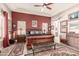 Well-lit main bedroom with decorative rug and comfortable furniture at 18346 W Rancho Ct, Litchfield Park, AZ 85340