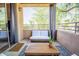 Relaxing balcony featuring a comfortable couch, chairs, and an outdoor rug at 20100 N 78Th Pl # 2098, Scottsdale, AZ 85255