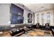 The game room boasts multiple TVs, decorative lighting, and comfortable seating for entertainment and relaxation at 20100 N 78Th Pl # 2098, Scottsdale, AZ 85255