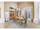 Elegant dining room with a large table, and a beautiful chandelier, perfect for entertaining at 25628 N Cordova Ln, Rio Verde, AZ 85263