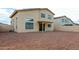 Backyard featuring a covered patio and rock landscaping at 25724 W St James Ave, Buckeye, AZ 85326