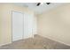 Neutral bedroom featuring carpet and a closet at 25724 W St James Ave, Buckeye, AZ 85326
