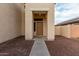 Inviting front entry featuring a covered porch that leads to the front door at 25724 W St James Ave, Buckeye, AZ 85326