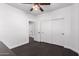 Bedroom featuring a ceiling fan and ample closet space at 290 N Nash Way, Chandler, AZ 85225