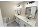 Luxurious bathroom featuring a double vanity with sleek fixtures and elegant design at 3345 E Edgewood Ave, Mesa, AZ 85204
