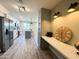 Bright kitchen featuring modern cabinets, stainless steel appliances, and a center island with seating at 3345 E Edgewood Ave, Mesa, AZ 85204