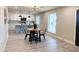 Open concept kitchen with stainless steel appliances and an island with barstool seating at 3345 E Edgewood Ave, Mesa, AZ 85204