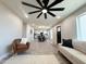 Inviting living room showcasing the kitchen, dining area, and open floor plan, perfect for entertaining at 3345 E Edgewood Ave, Mesa, AZ 85204