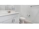 Clean bathroom featuring a toilet, sink, mirror, and white cabinets at 4402 W Bush Bean Way, San Tan Valley, AZ 85144