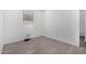 An empty room showcasing tiled flooring and natural light from the window at 4402 W Bush Bean Way, San Tan Valley, AZ 85144