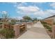 Community play area featuring a small stage and various play structures at 4609 S 122Nd S Dr, Avondale, AZ 85323