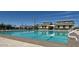 Sparkling community pool with lounge seating and clubhouse; perfect for relaxation and recreation at 4609 S 122Nd S Dr, Avondale, AZ 85323