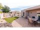 Backyard with custom water feature and mature trees provides a private retreat at 6202 E Mckellips Rd # 210, Mesa, AZ 85215